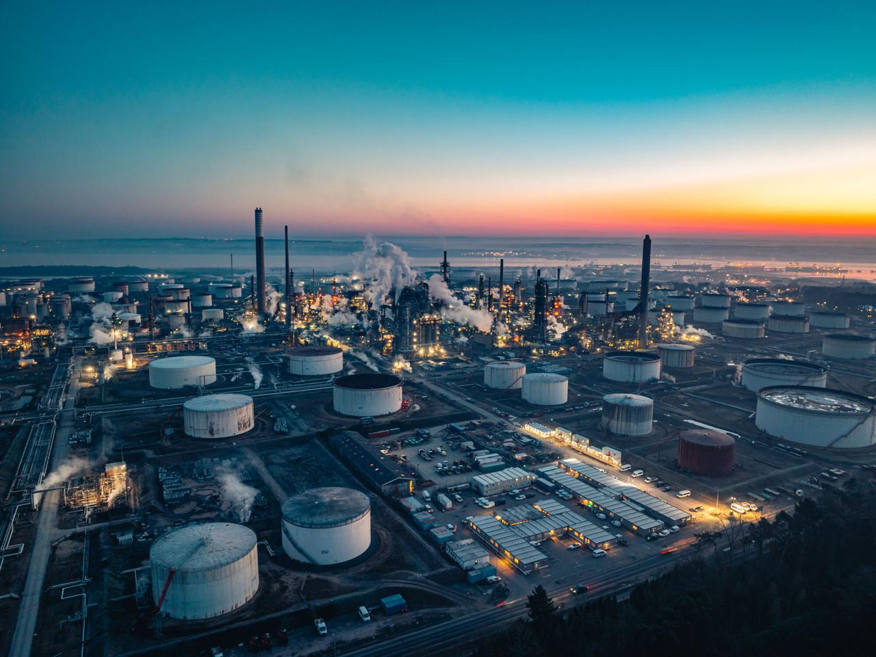 Oil refinery at twilight an aerial view of industrial power and energy production